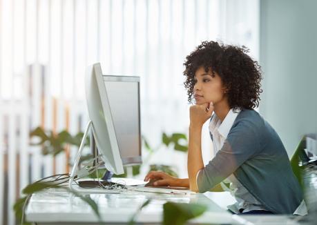 Looking for the full policy manual?, women looking on computer