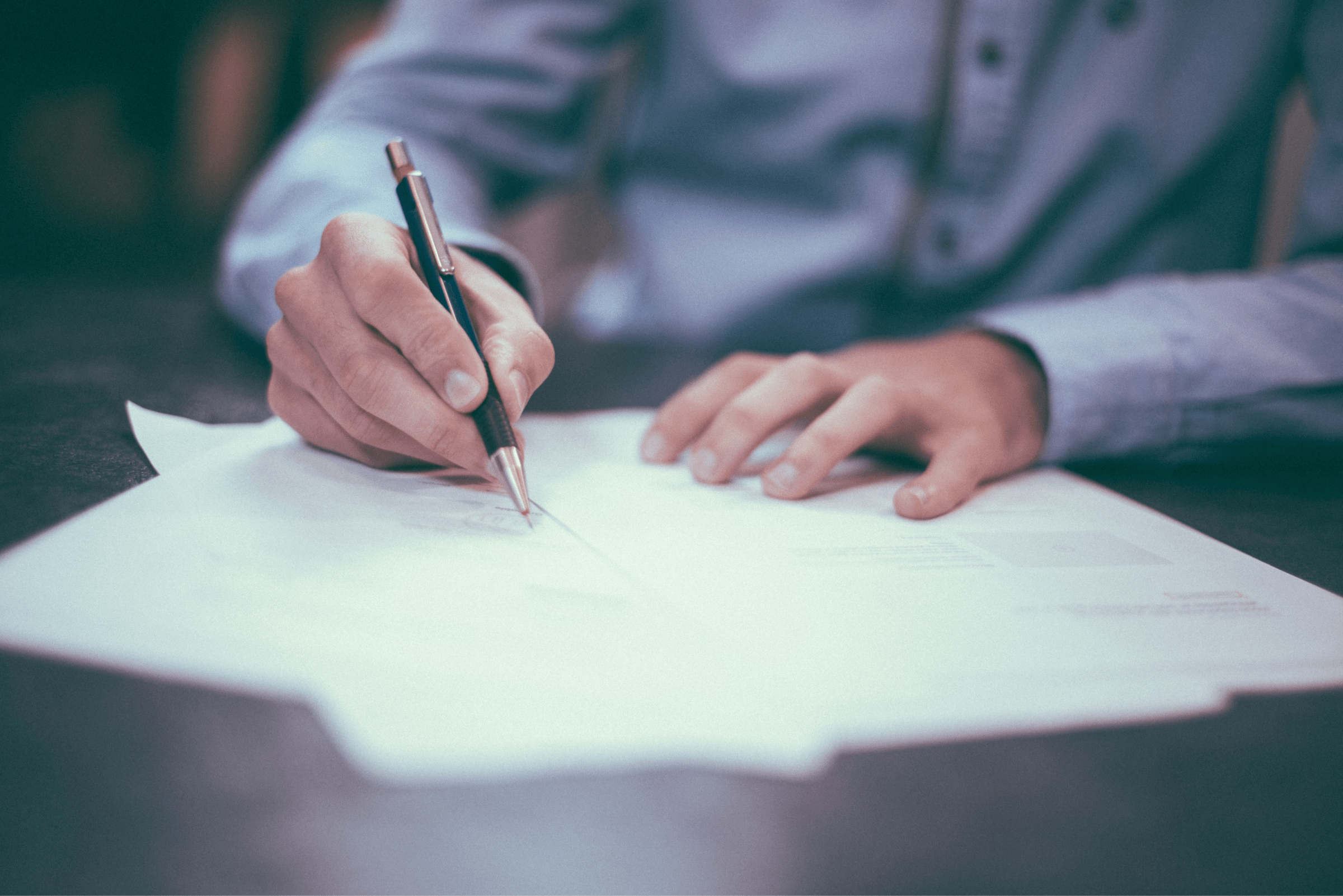 A person signing a document