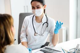 Doctor speaking with a patient